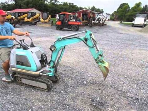 stand behind mini excavator|mini excavator fit through door.